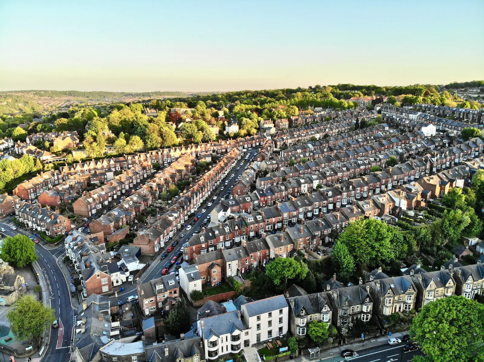an aerial view of a city with lots of houses